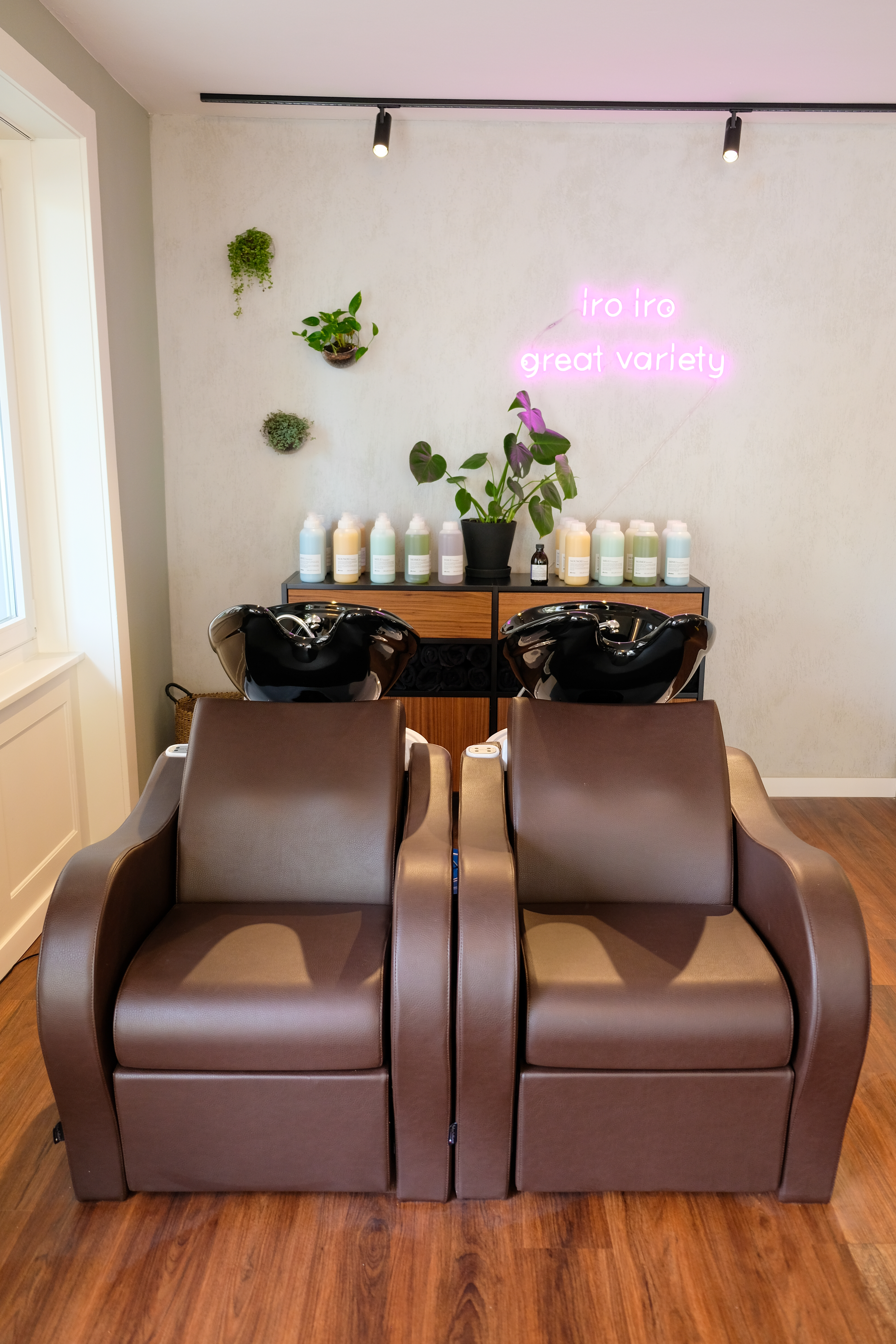 Wash stations under neon sign